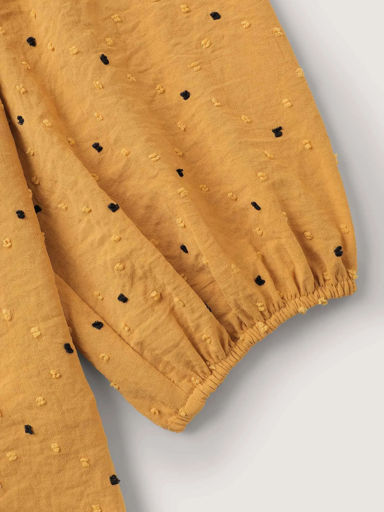 Textured Dot Embroidered Tassel Flowy Blouse sold by Bloomchic product image thumbnail 5