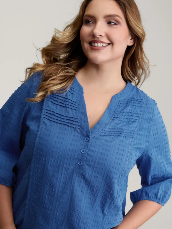 Textured Pleated Notched Neckline Blouse sold by Bloomchic