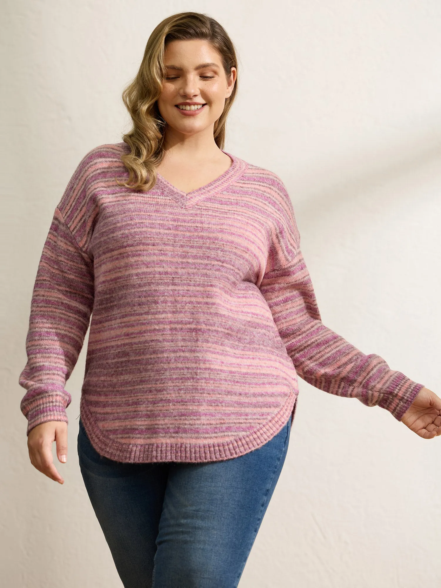 Ribbed Texture Curvy Hem V-Neck Pullover sold by Bloomchic