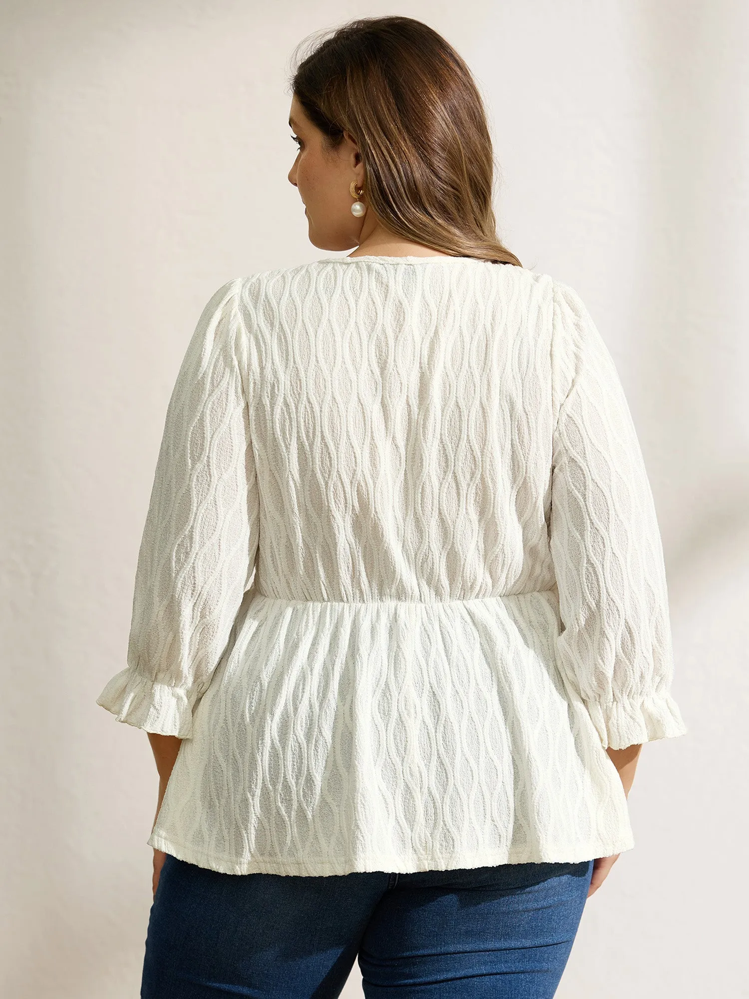 Textured Puffy Sleeve V-Neck Blouse sold by Bloomchic product image thumbnail 4