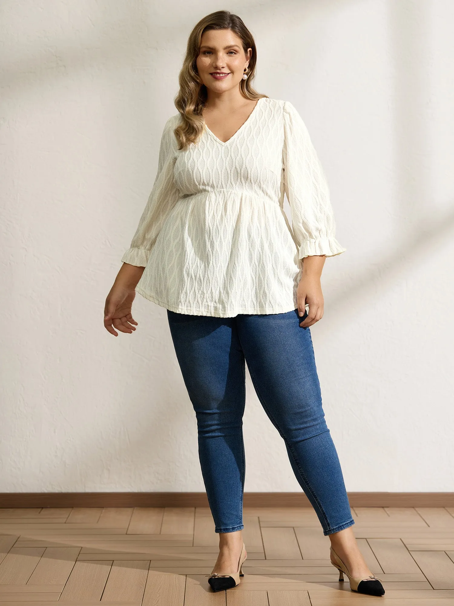 Textured Puffy Sleeve V-Neck Blouse sold by Bloomchic product image thumbnail 3