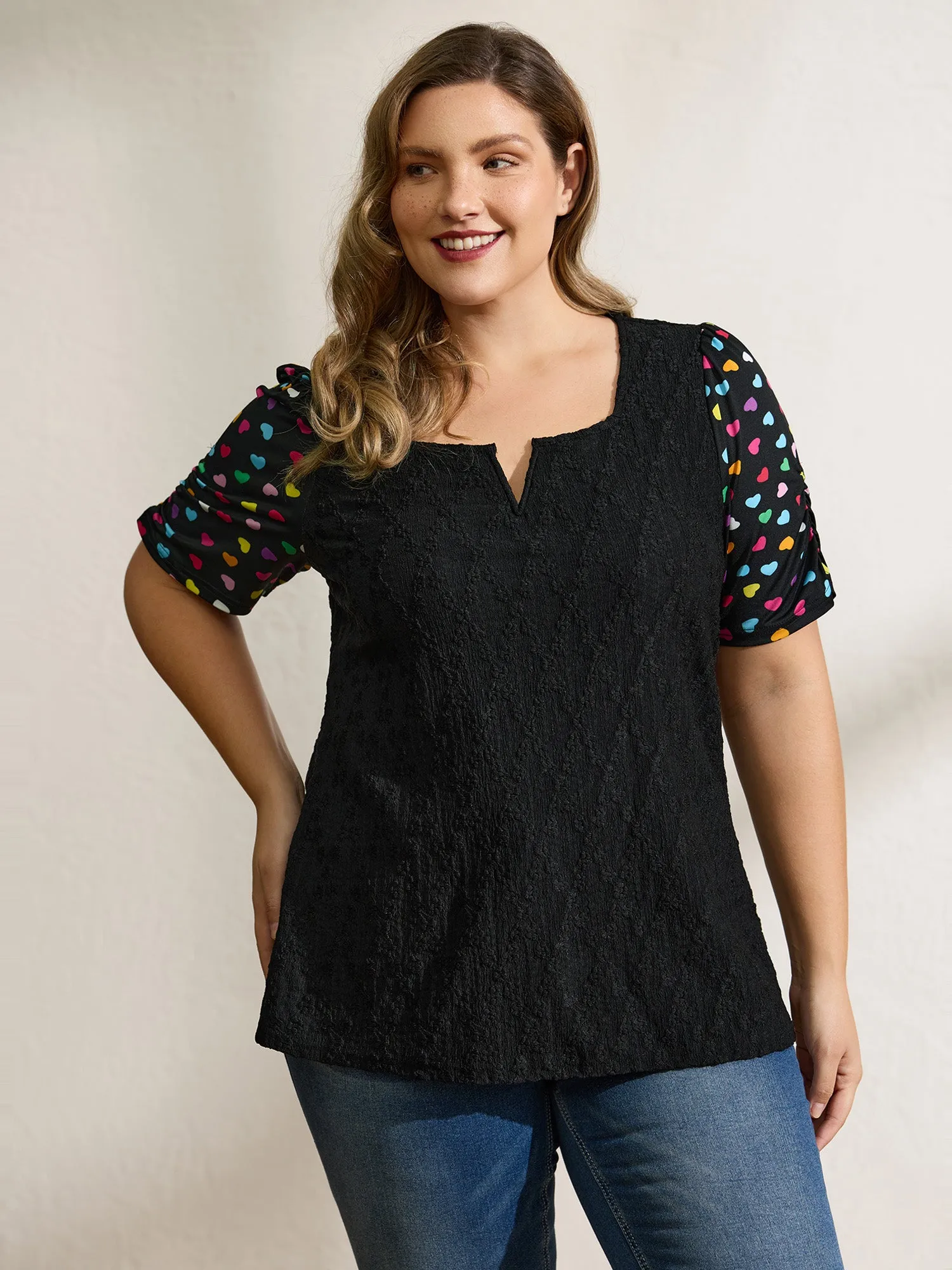 Colorful Hearts Textured Split Neck Knit Top sold by Bloomchic