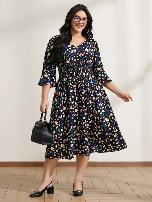 Leopard Print Shirred Waist V-Neck Midi Dress sold by Bloomchic