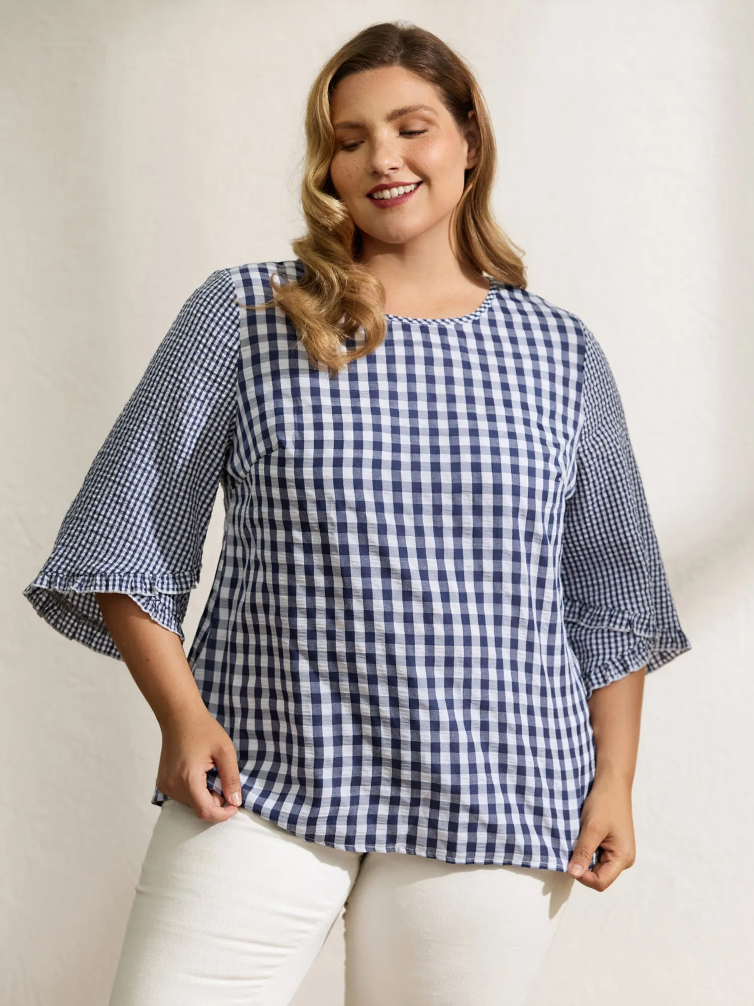 Checkered Print Flared Overlap Sleeve Blouse sold by Bloomchic