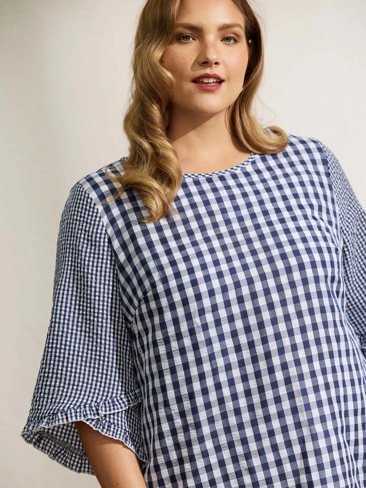 Checkered Print Flared Overlap Sleeve Blouse sold by Bloomchic product image thumbnail 2