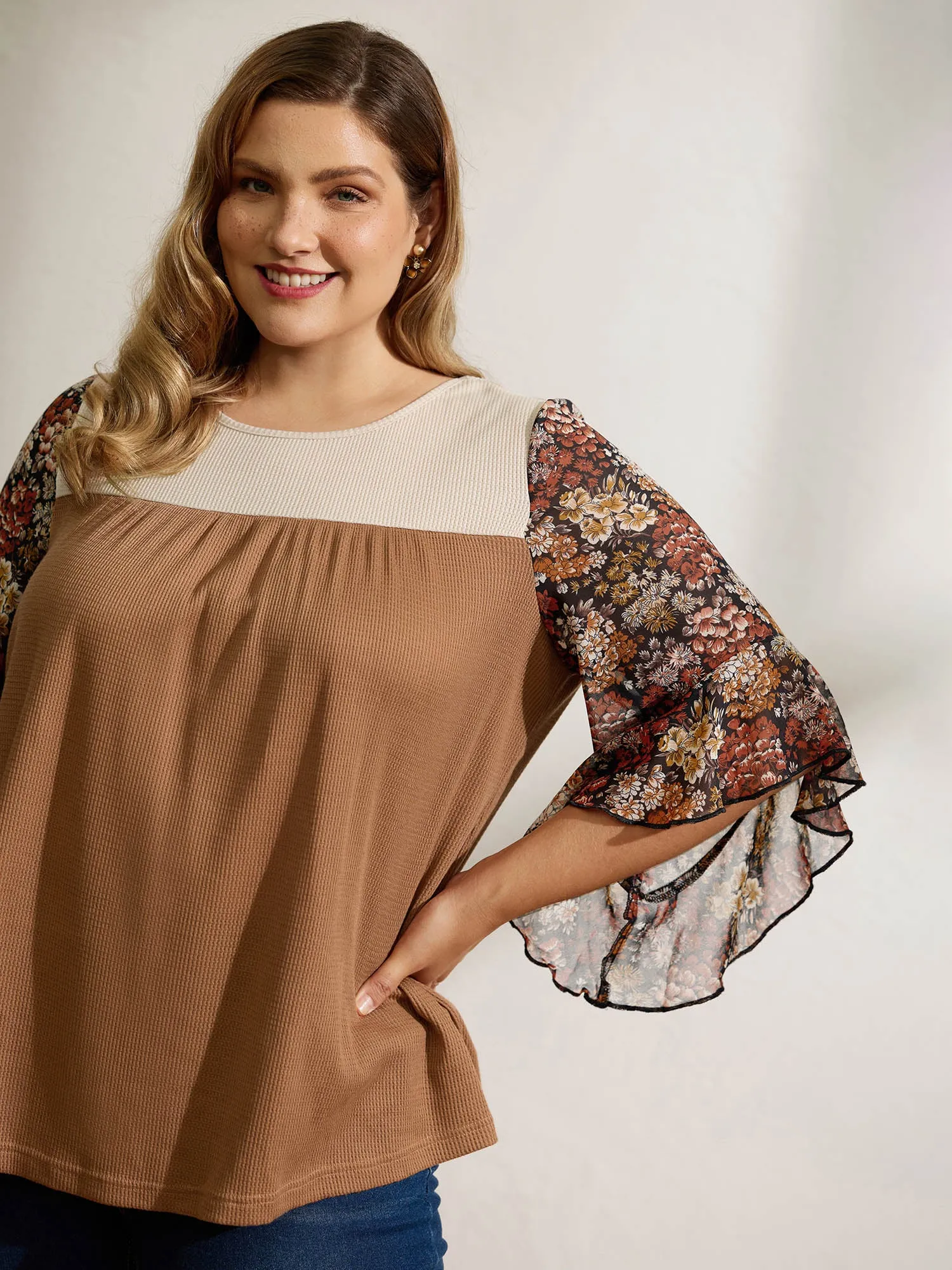 Colorblock Floral Sleeve Flowy Knit Top sold by Bloomchic