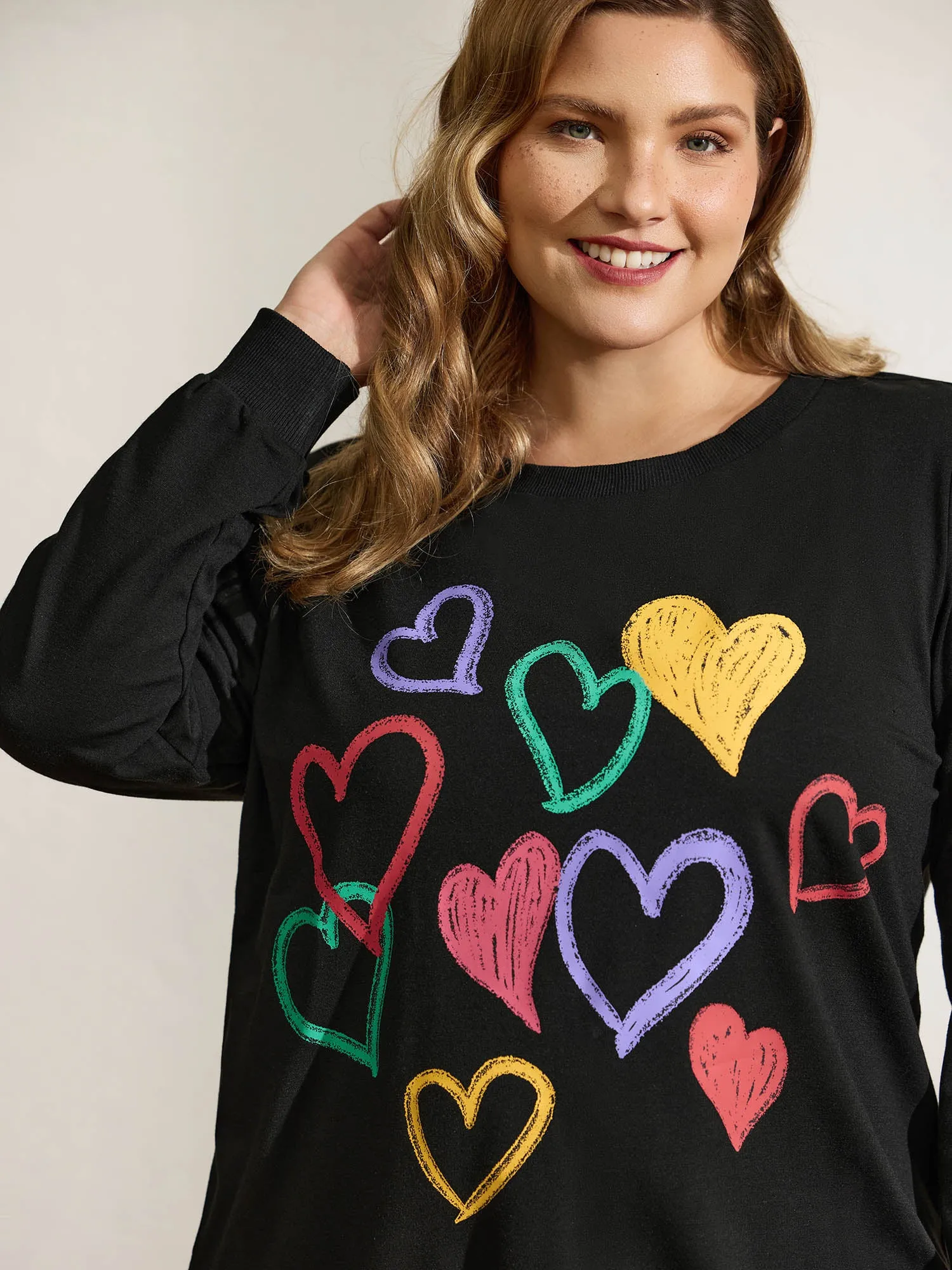 Colorful Foam Printed Hearts Stretchy Hem Sweatshirt sold by Bloomchic