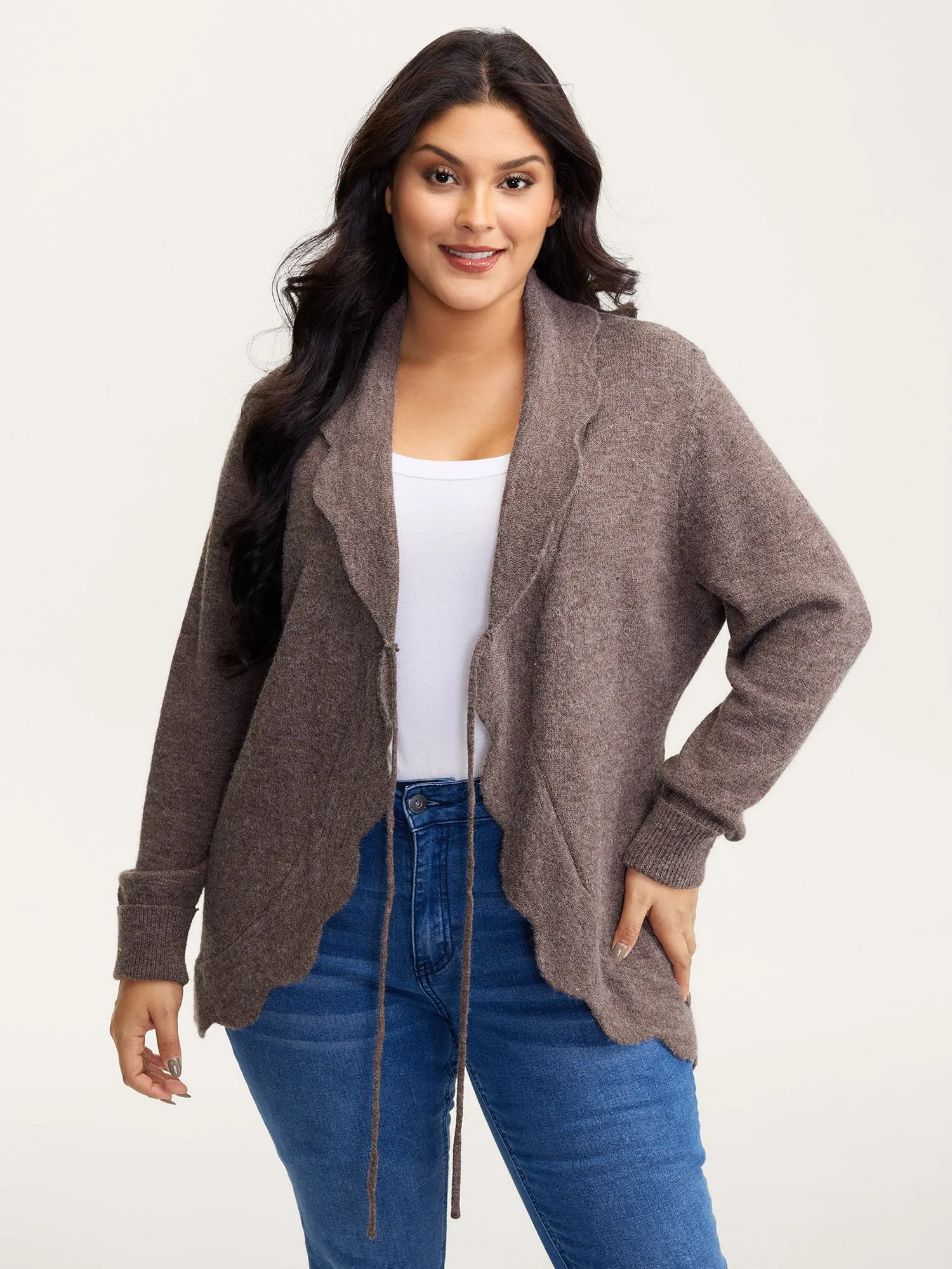 Wavy Arc Hem Tie-Front Knit Cardigan sold by Bloomchic