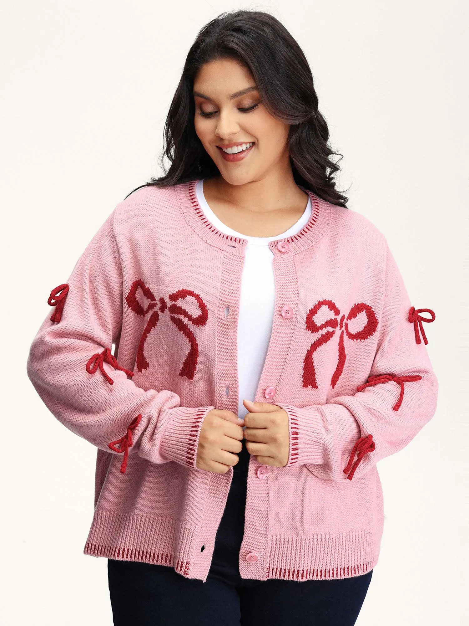 Bowknot Pattern Textured Knit Cardigan sold by Bloomchic