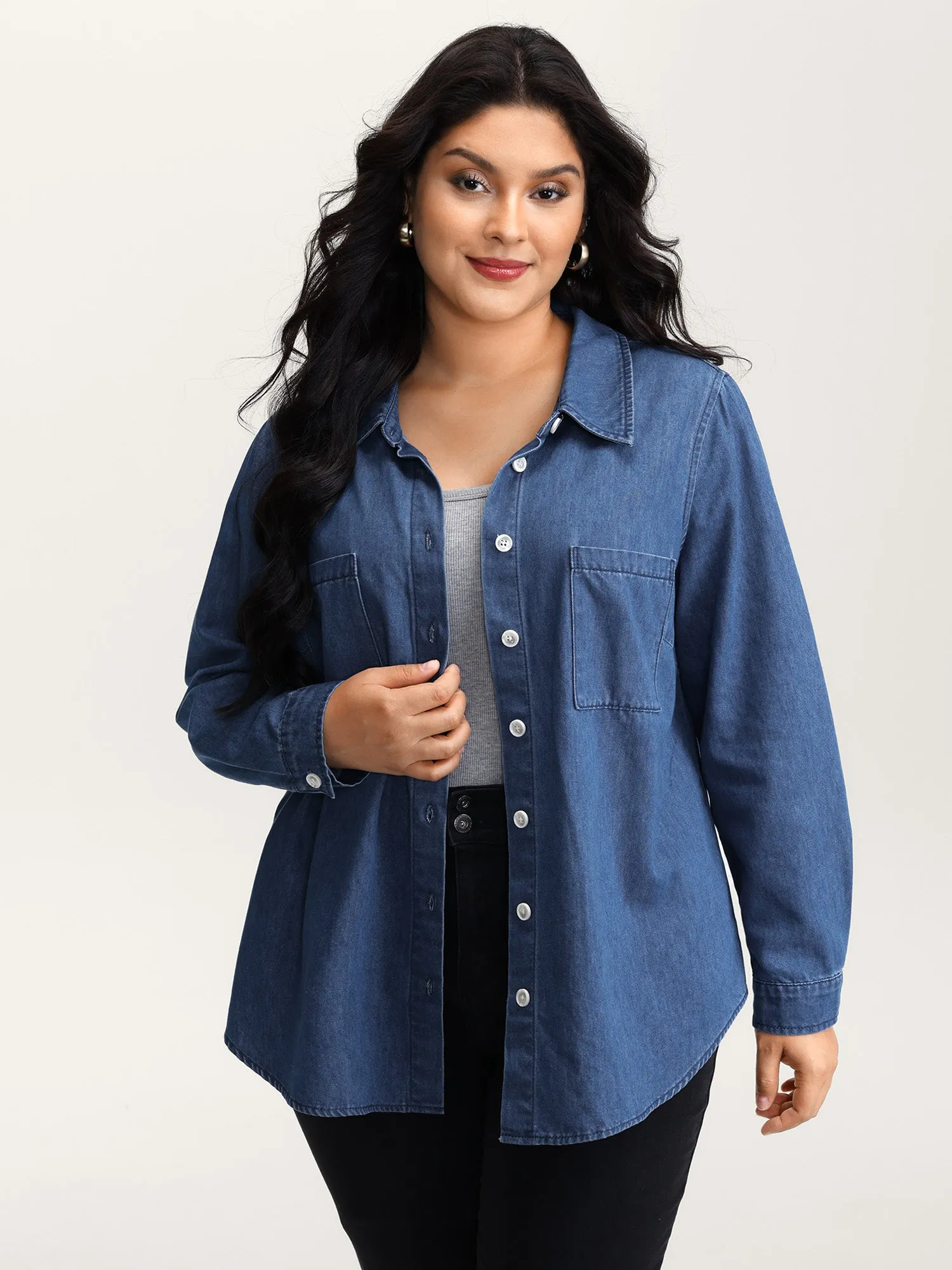 Arc Hem Pockets Denim Top sold by Bloomchic