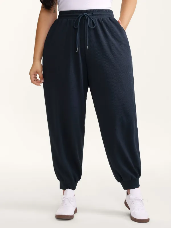Textured Waist Drawstring Jogger Pants sold by Bloomchic
