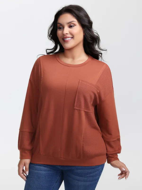 Textured Relaxed-Fit Spliced Sweatshirt sold by Bloomchic