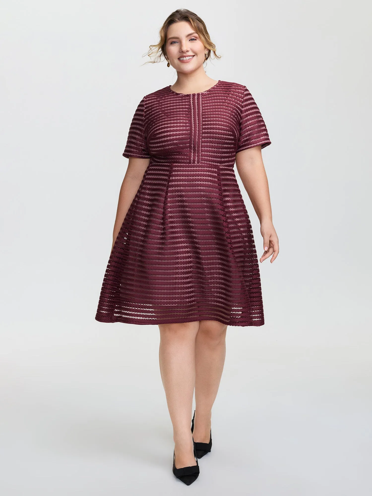 Striped Textured Zipper Lined Mini Dress sold by Bloomchic