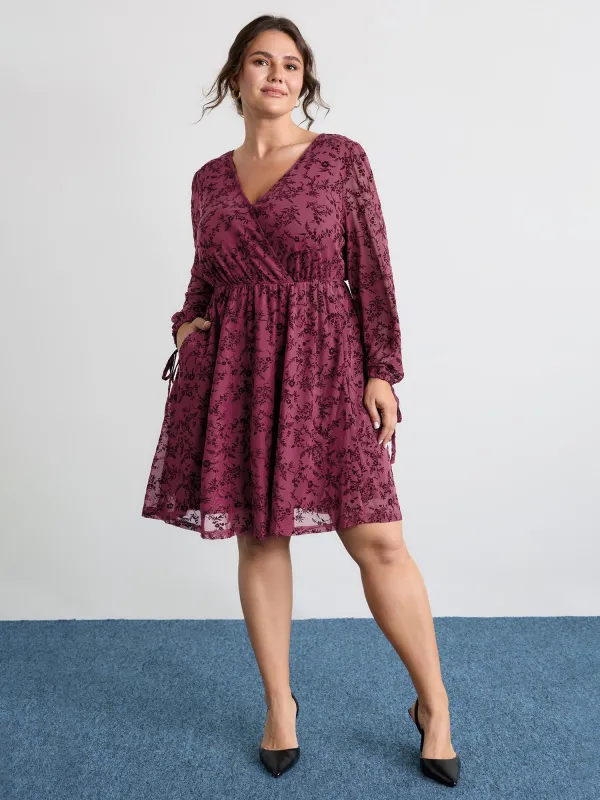 Flocked Wrap Backless Tie Pockets Mini Dress sold by Bloomchic
