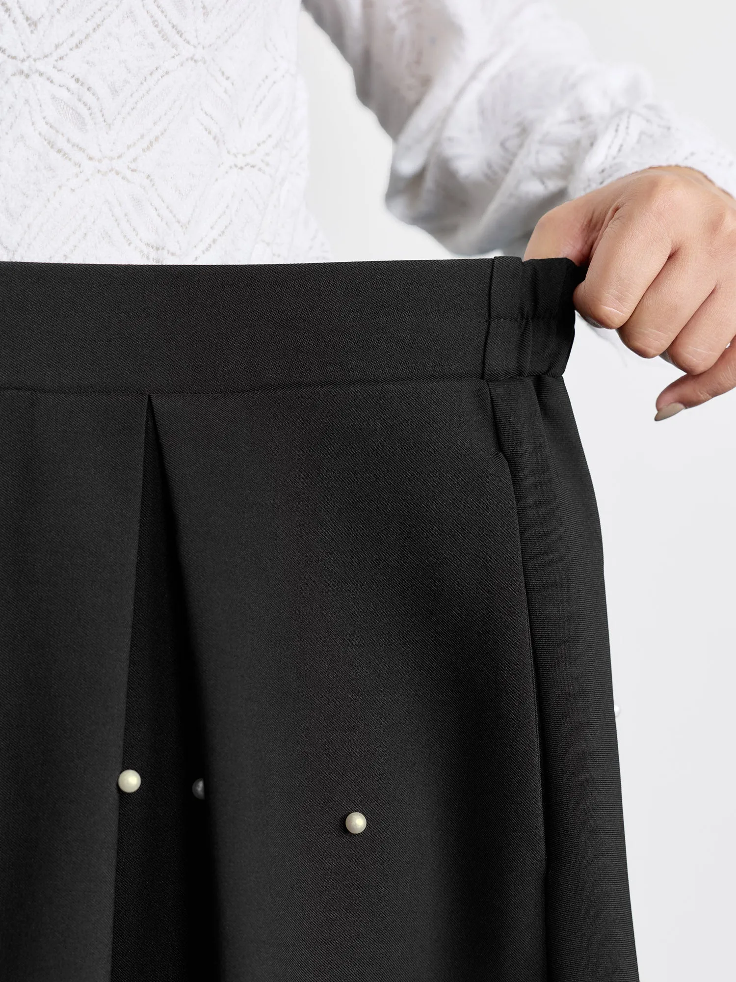 Beadwork Pleated Solid Midi Skirt sold by Bloomchic product image thumbnail 5