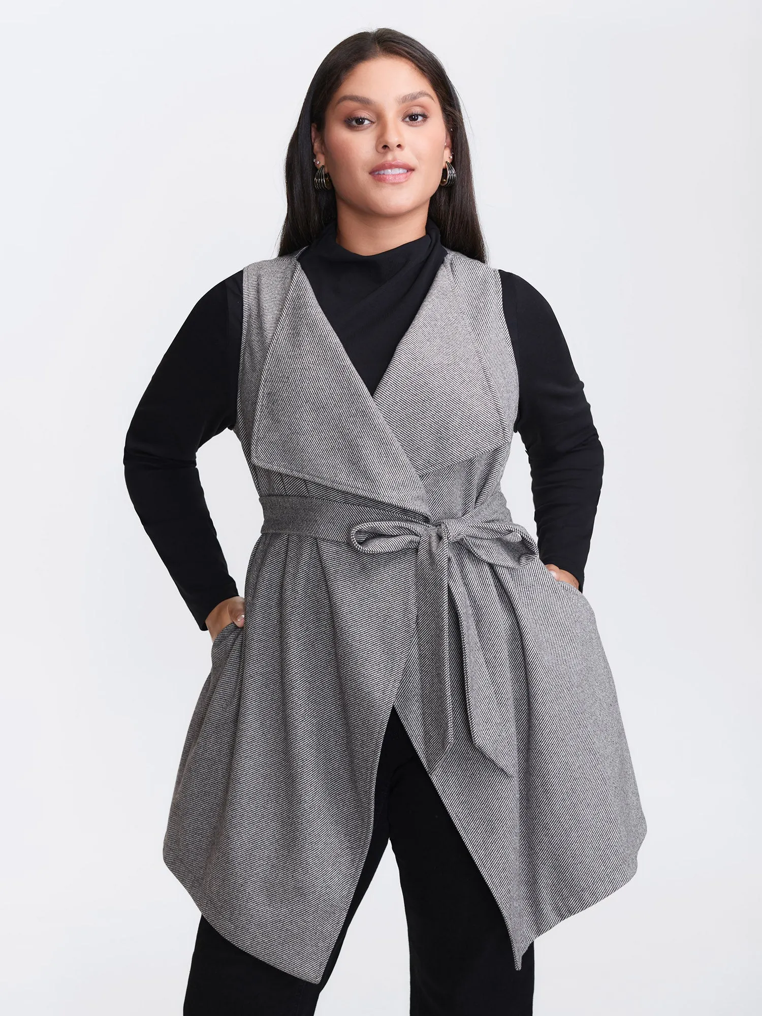 Asymmetrical Placket Belted Long Vest sold by Bloomchic