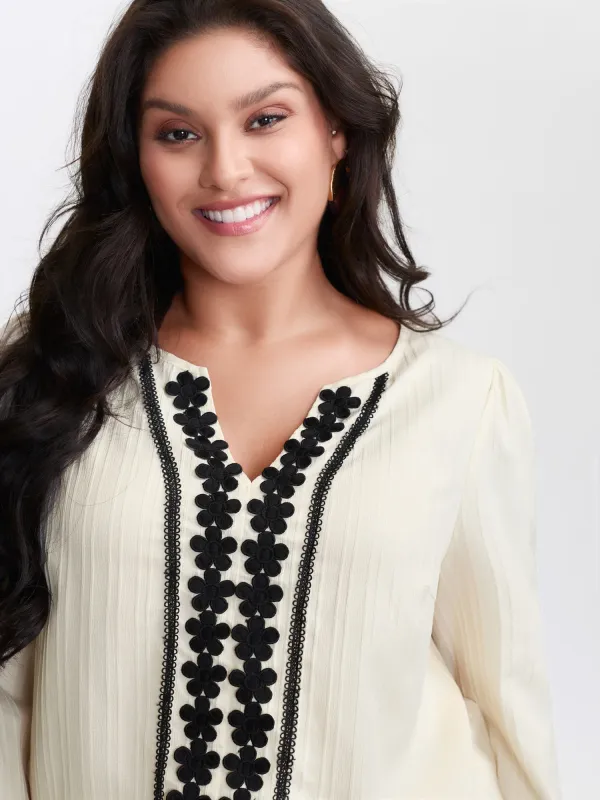 Lace Spliced Textured Lantern Sleeve Blouse sold by Bloomchic