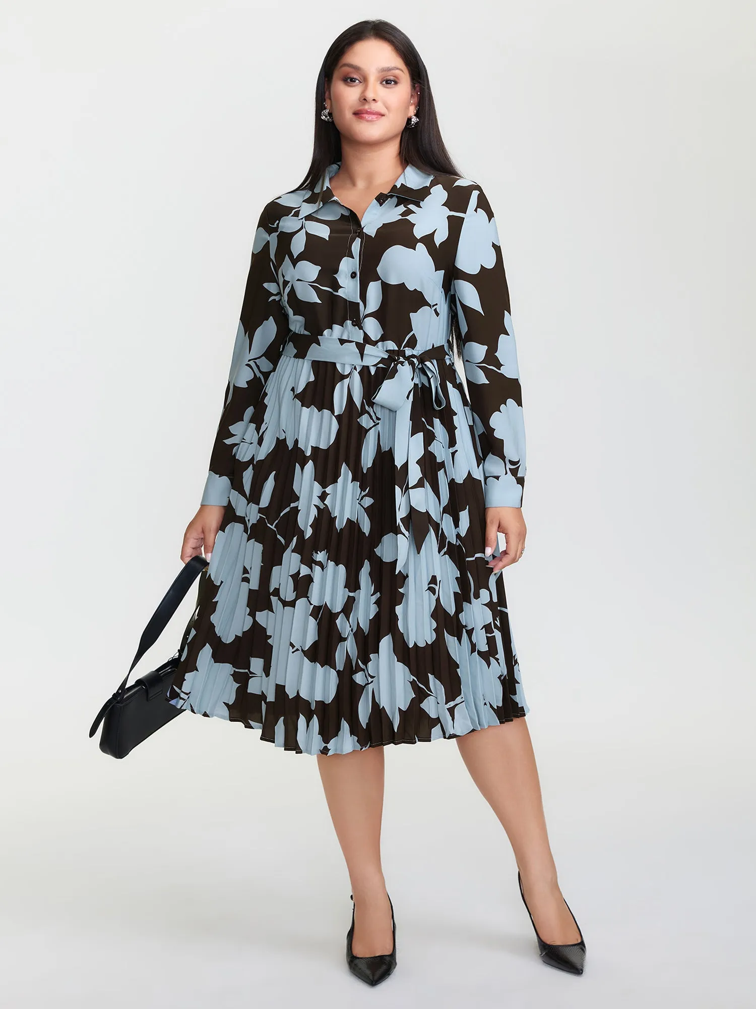 Monochrome Floral Pleated Belted Midi Dress sold by Bloomchic