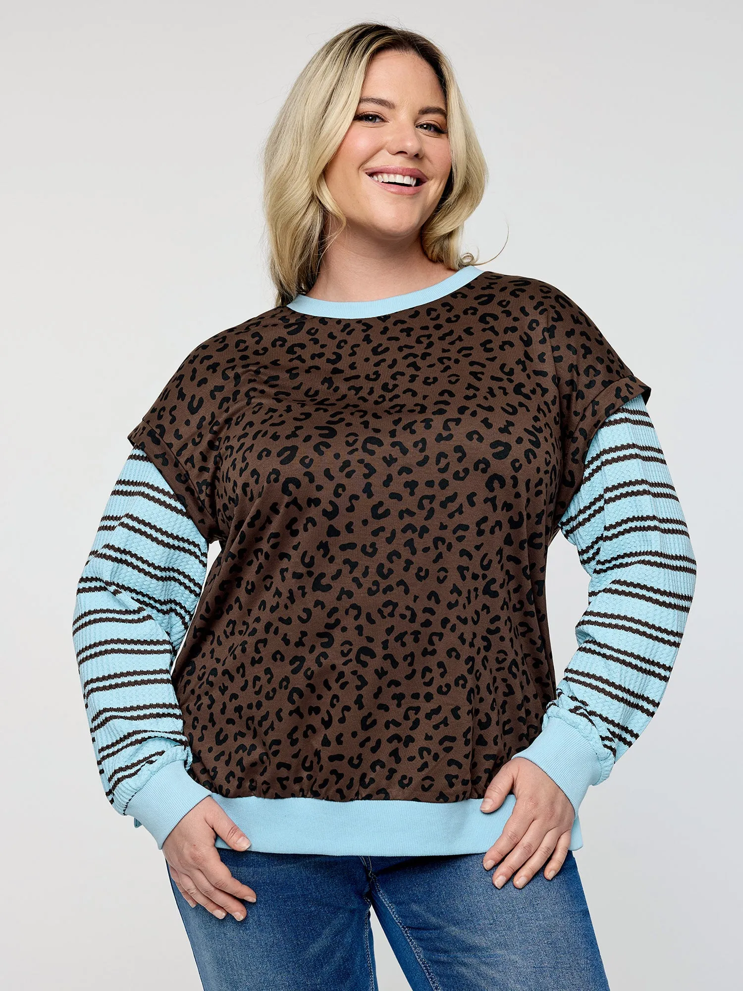 Leopard Stripe Print Textured Sweatshirt sold by Bloomchic