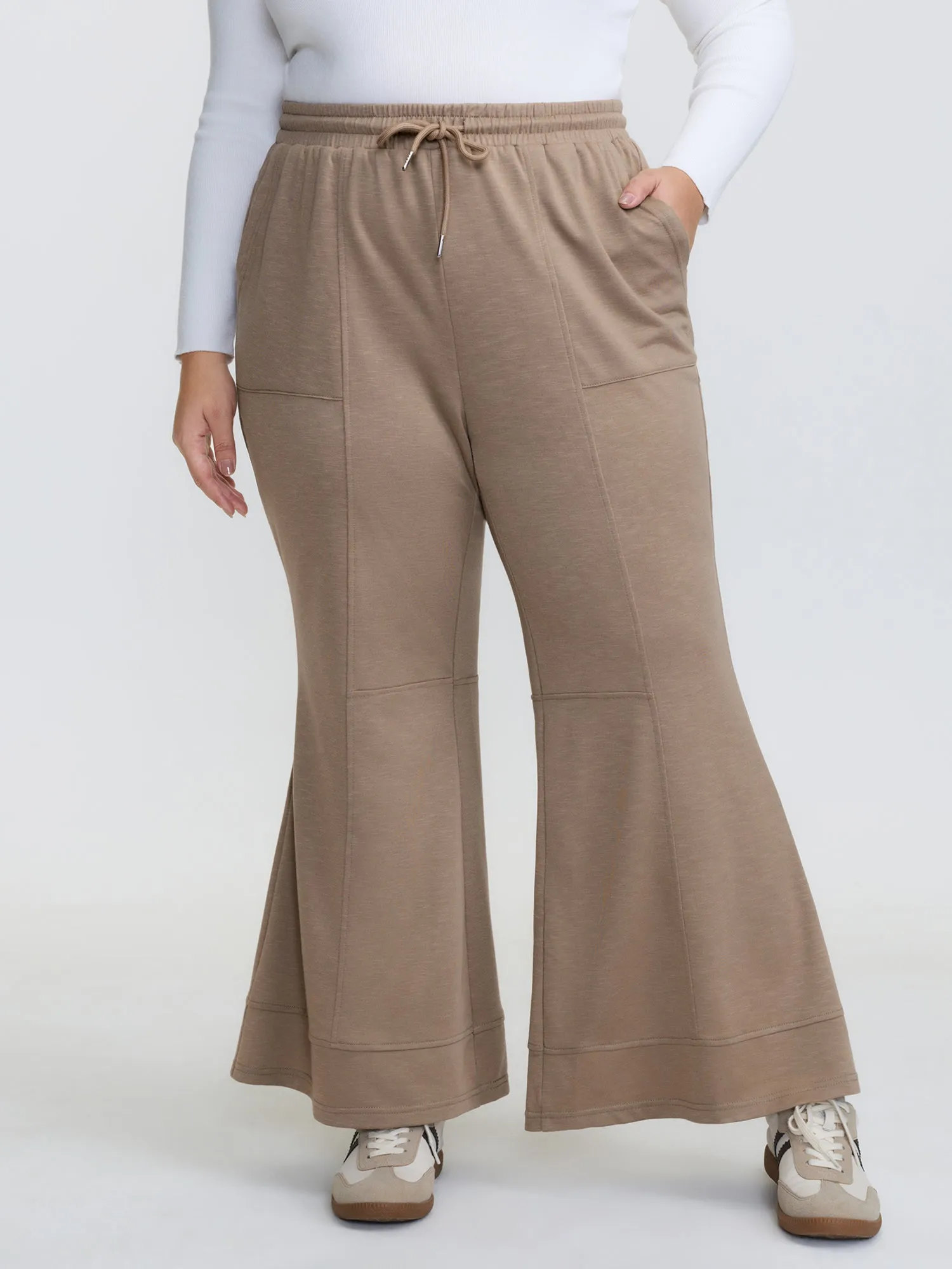 Drawstring Flared Hem Pants sold by Bloomchic