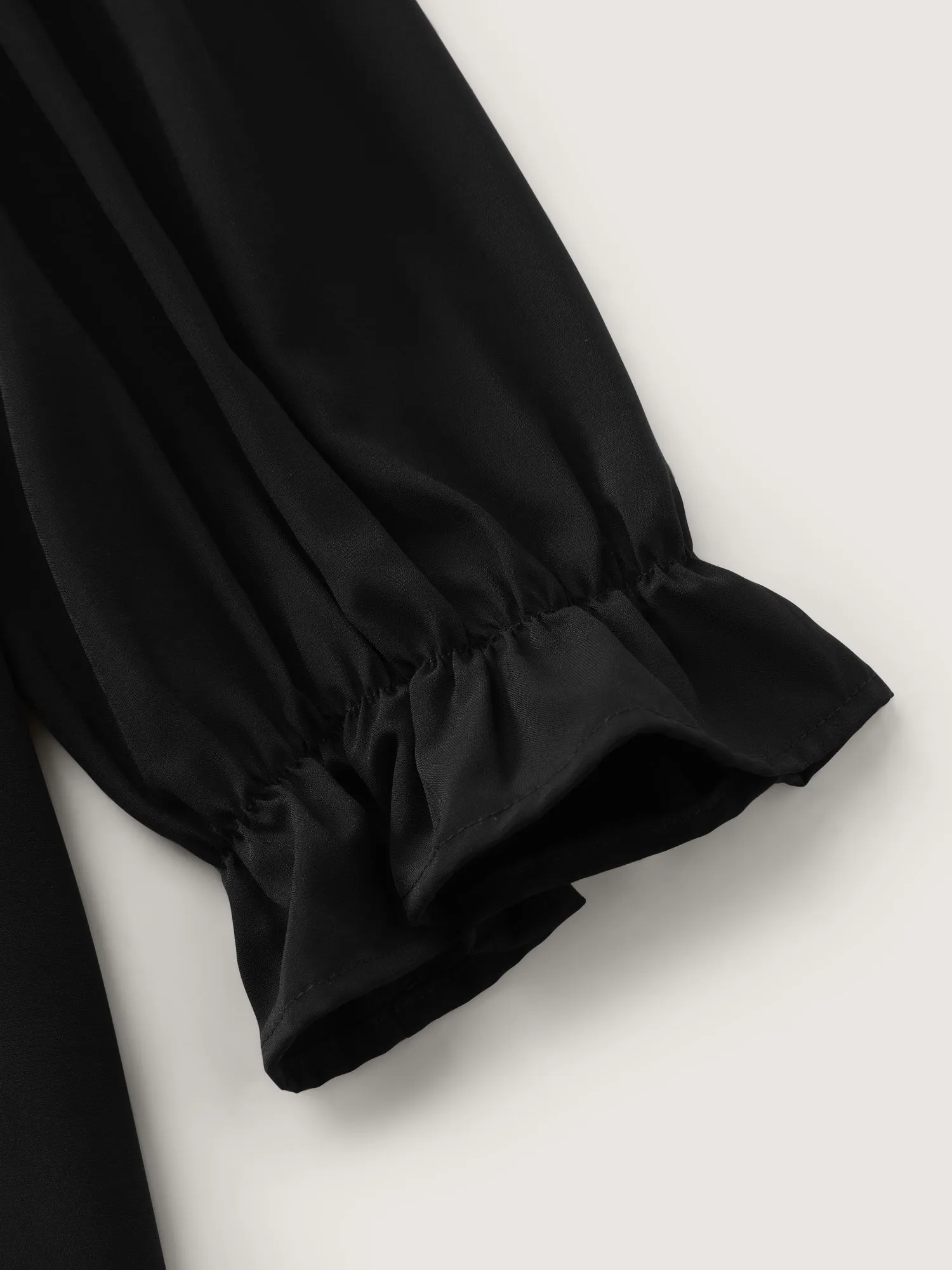 Overlap Hem Stretchy Cuff Sleeve Blouse sold by Bloomchic product image thumbnail 5