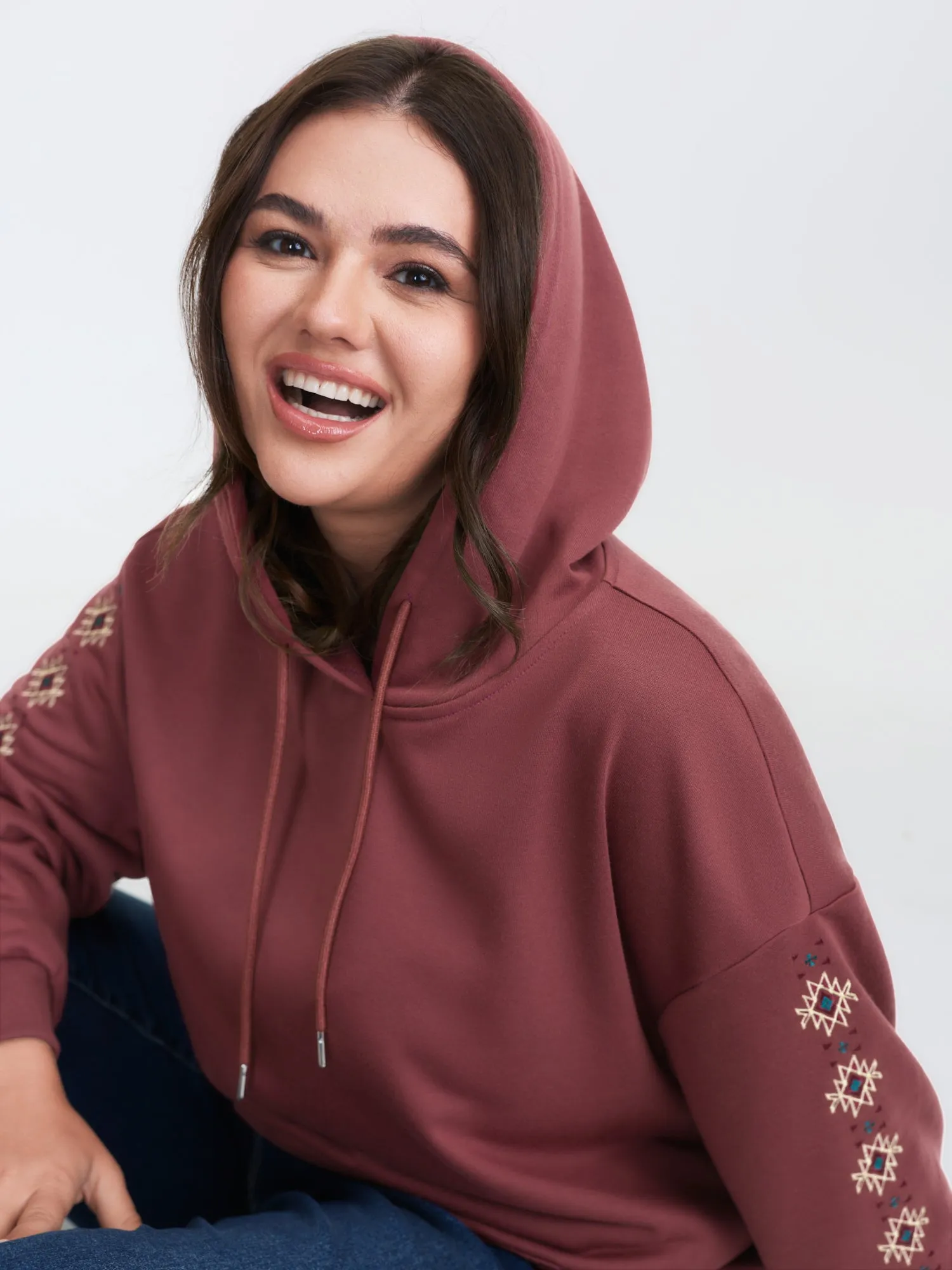 Embroidered Sleeve Pockets Hoodie sold by Bloomchic