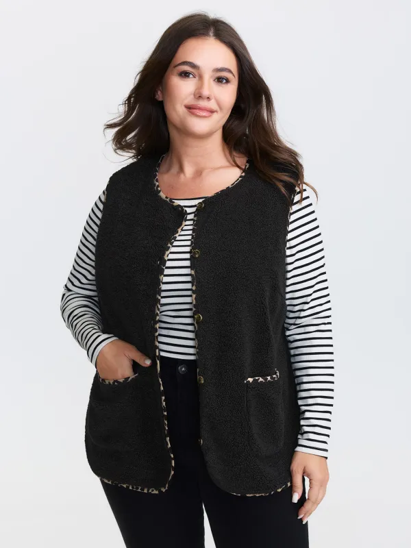 Faux Shearling Patchwork Leopard Edge Vest sold by Bloomchic