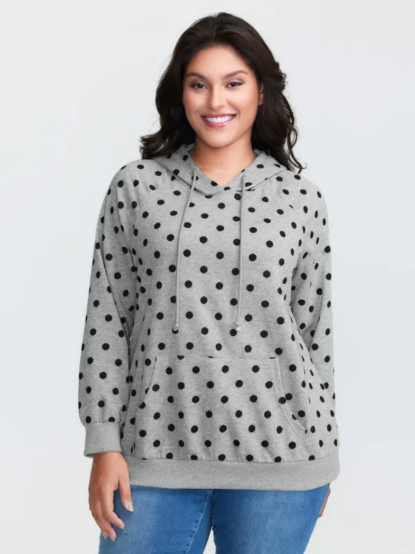 Polka Dot Drawstring Neck Hoodie sold by Bloomchic