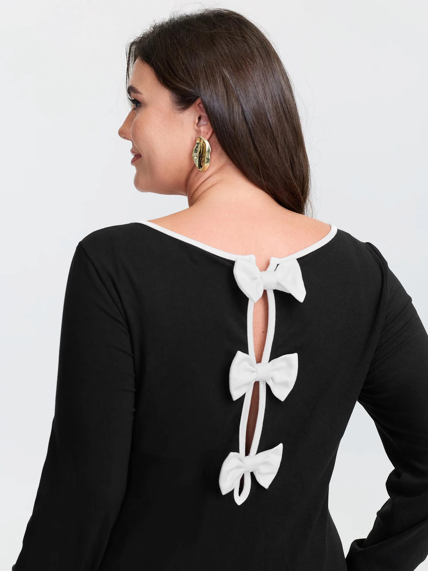Stretchy Multiple Bow Back Cut-Out Knit Top sold by Bloomchic