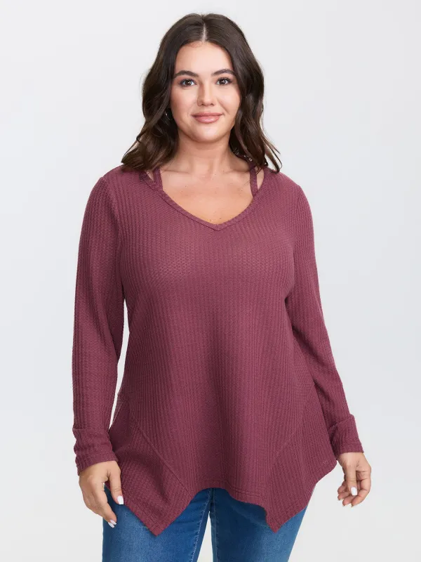 Textured Asymmetrical Hem Cut-Out Knit Top sold by Bloomchic
