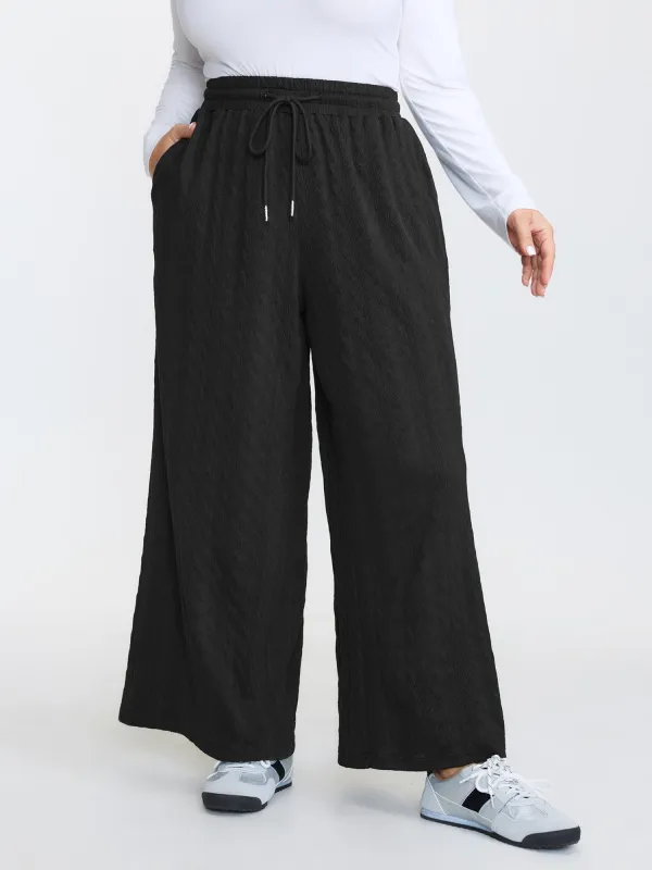 Stretchy Textured Drawstring Waist Pants made by Bloomchic
