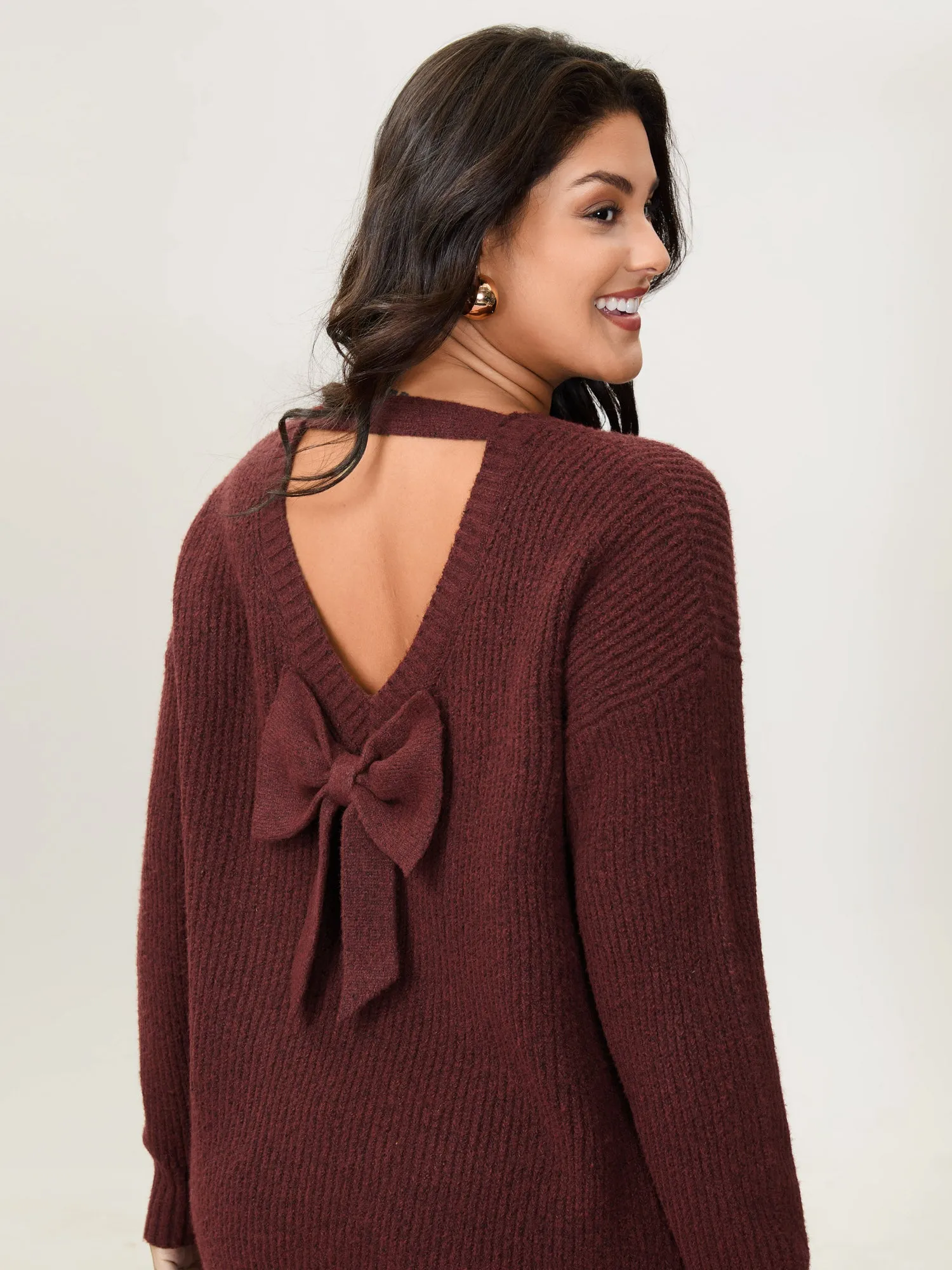 Bow Back Cut-Out Super Stretchy Pullover sold by Bloomchic