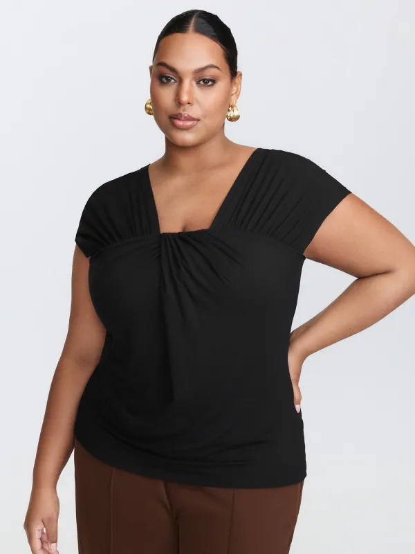 Pleated Irregular Sleeve Knotted Bust Top sold by Bloomchic