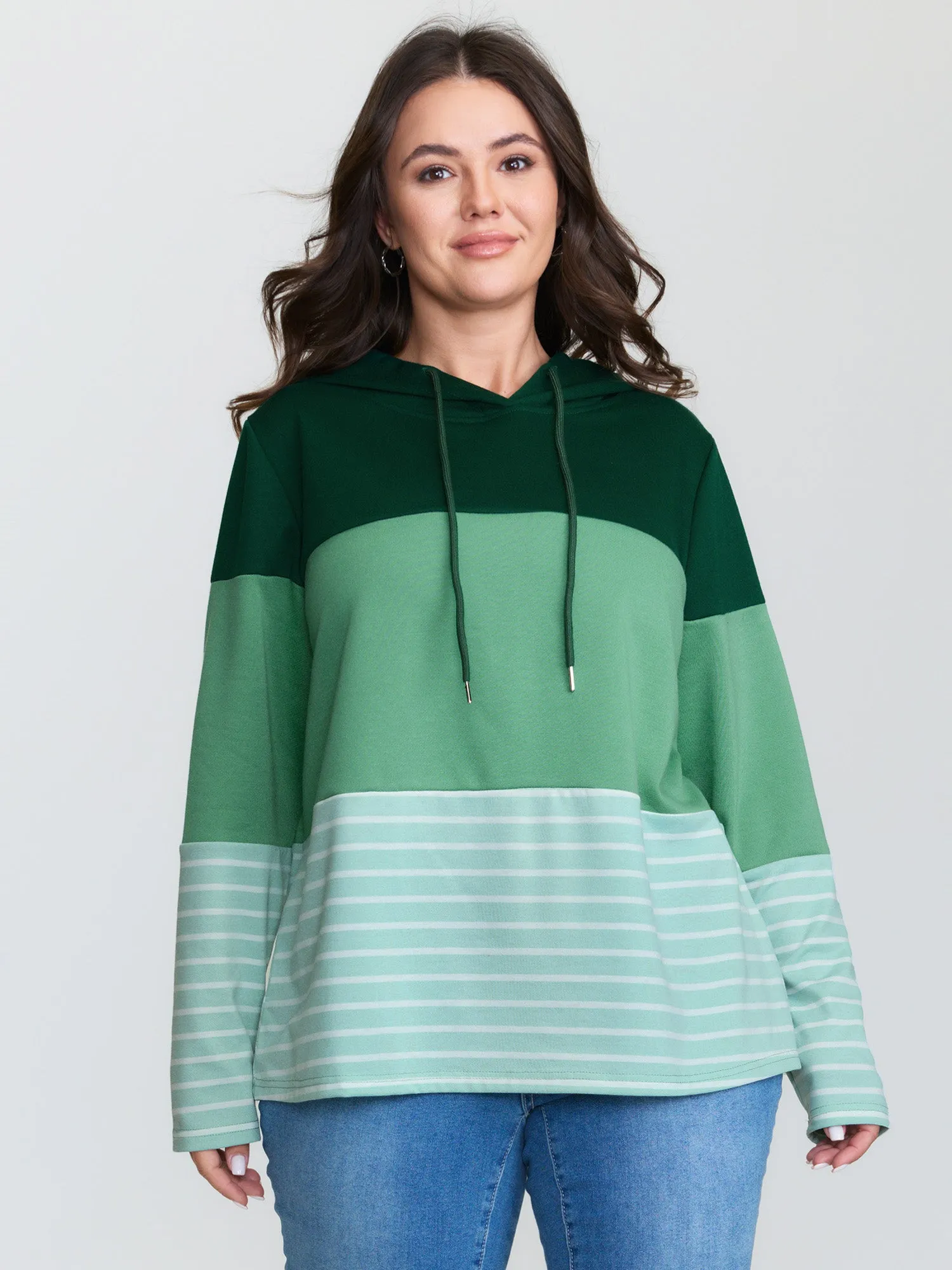 Patchwork Striped Drawstring Hoodie sold by Bloomchic