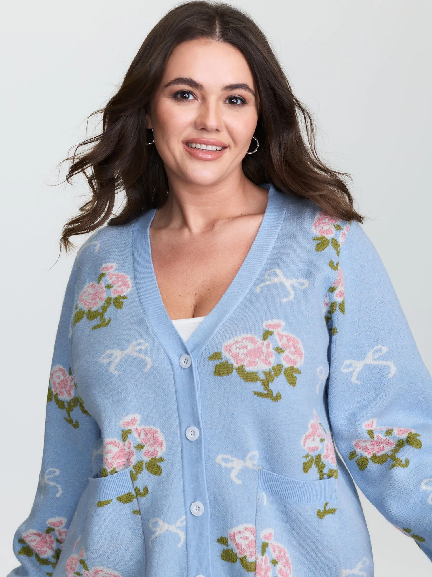 Beautiful Floral Bow Pattern Jacquard Knit Cardigan sold by Bloomchic