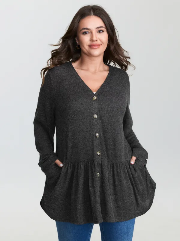 Textured Ruffled Hem Button Blouse sold by Bloomchic