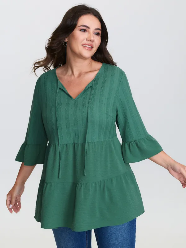 Textured Tiered Neck-Tie Blouse sold by Bloomchic