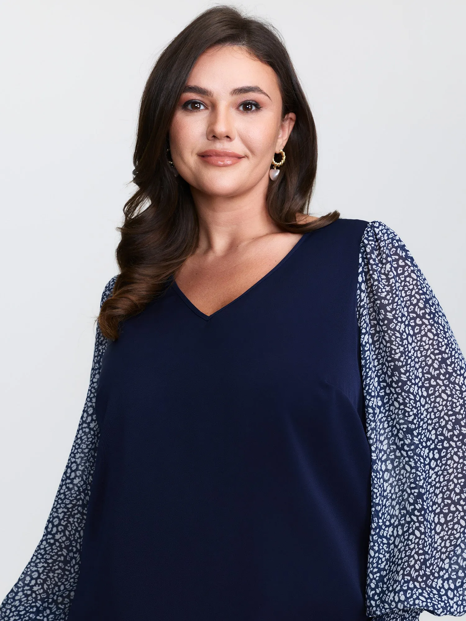 Leopard Print Contrast V-Neck Knit Top sold by Bloomchic product image thumbnail 2