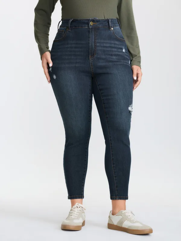 Stretchy Skinny Mid-Rise Jeans sold by Bloomchic