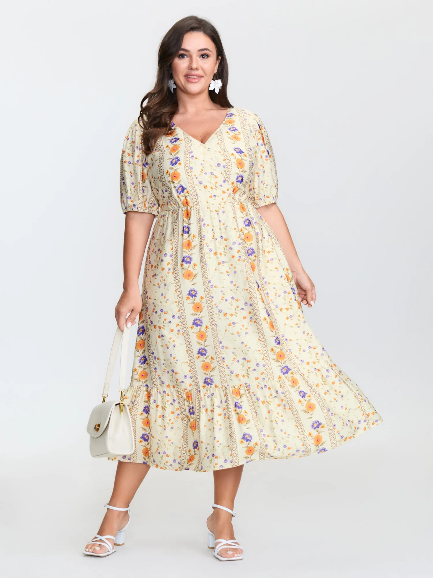 Floral Print Surplice Neck Tie Midi Dress sold by Bloomchic