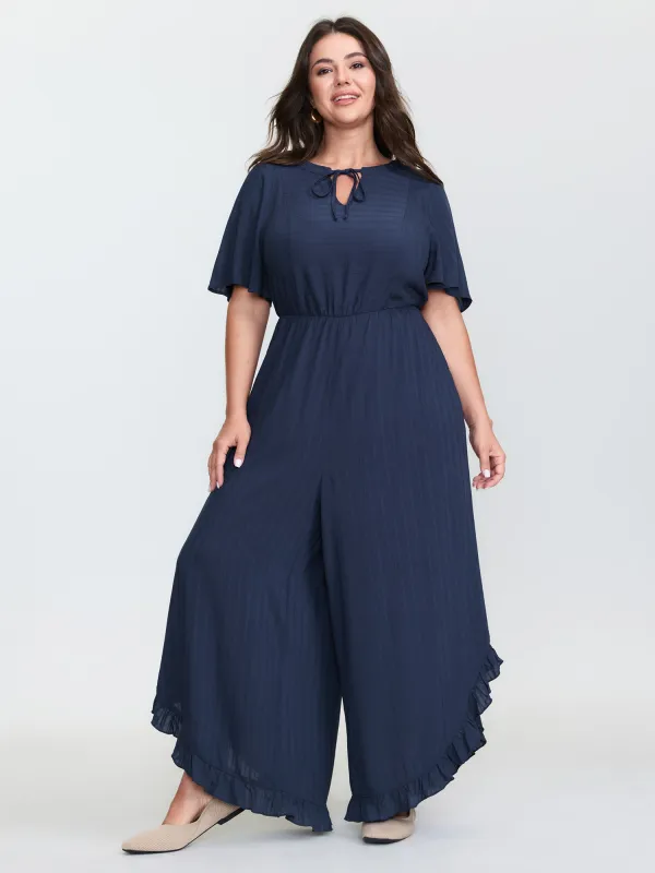 Textured Ruffled Backless Tie Jumpsuit sold by Bloomchic