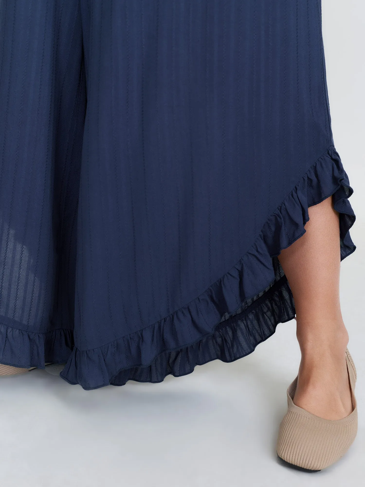 Textured Ruffled Backless Tie Jumpsuit sold by Bloomchic product image thumbnail 5