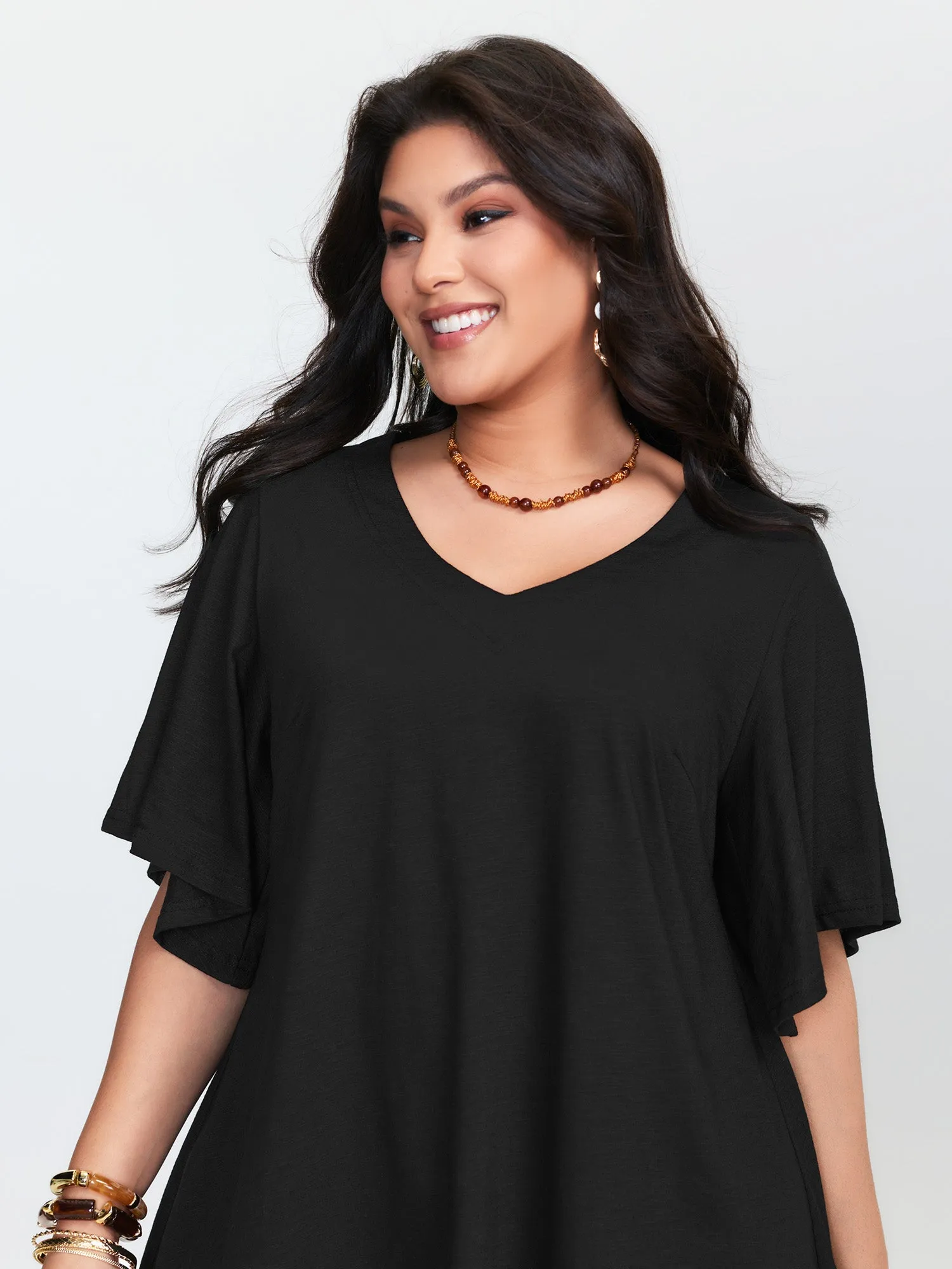 Asymmetrical Tassel Hem Plain Tunic sold by Bloomchic product image thumbnail 3