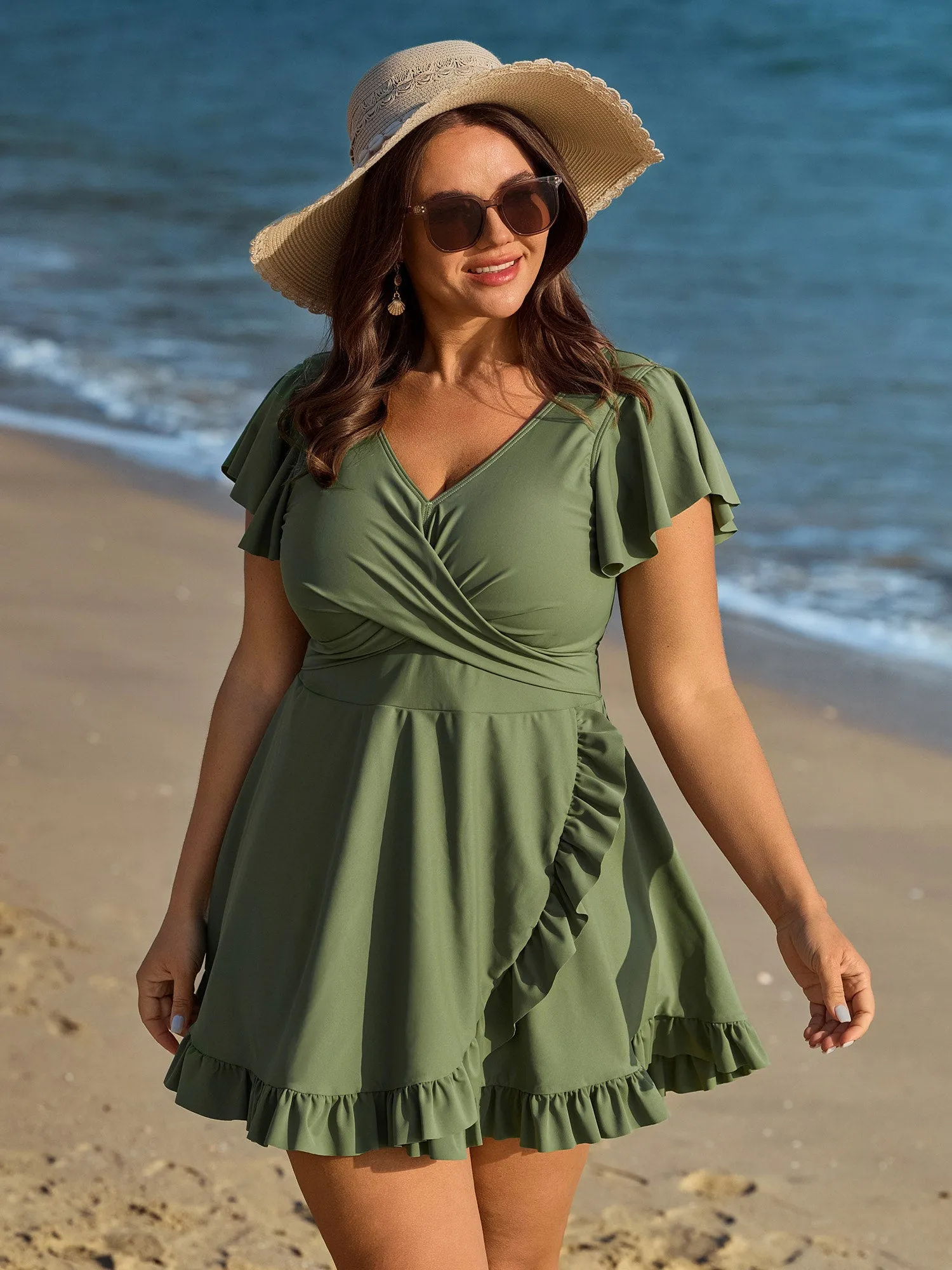 Ruffled Sleeve Curvy Hem Swim Dress sold by Bloomchic