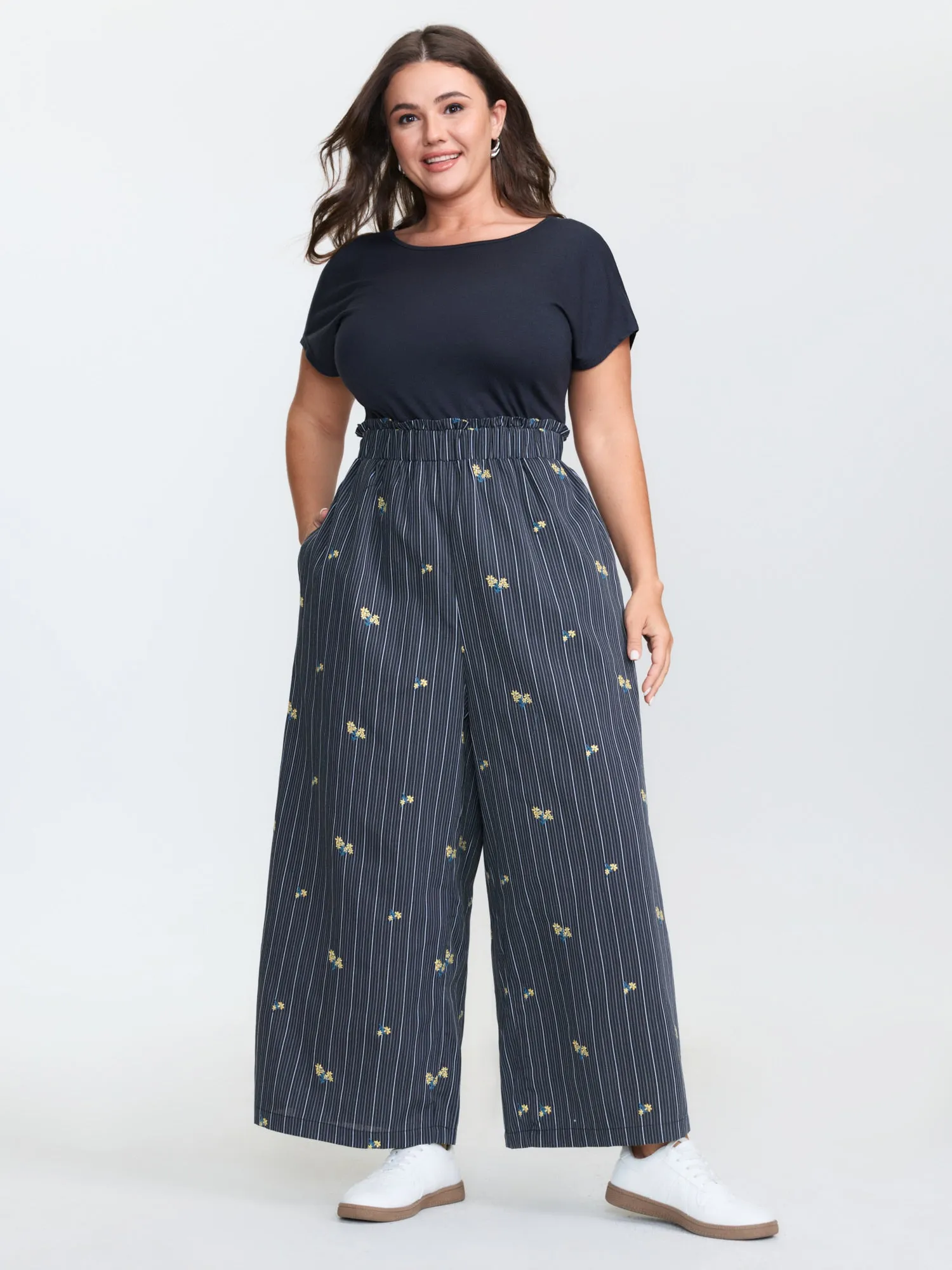 Floral Embroidered Textured Back-Tie Jumpsuit sold by Bloomchic