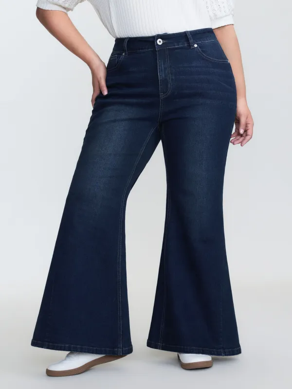 Stretchy Mid-Rise Flared Jeans sold by Bloomchic