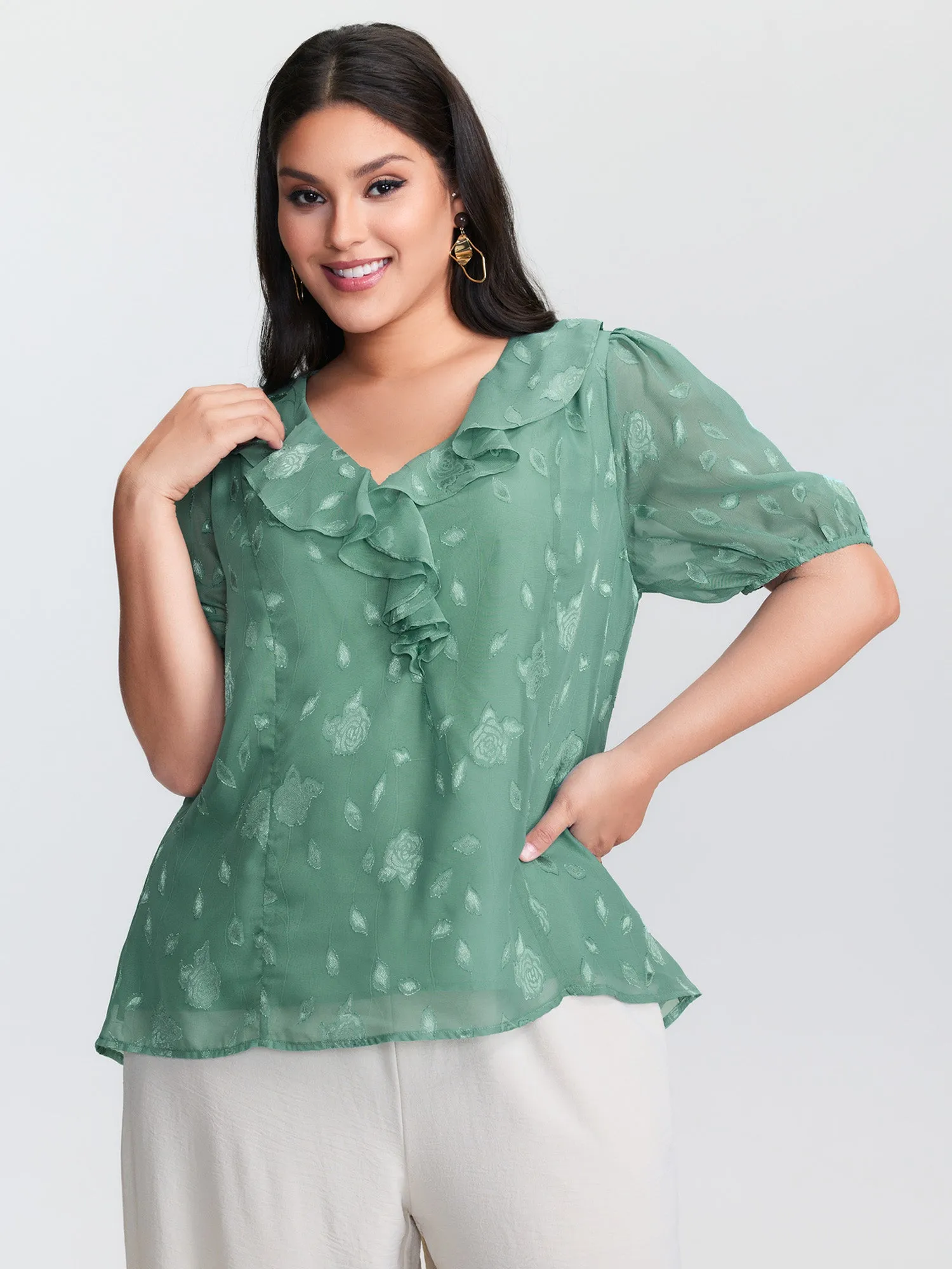 Lotus Leaf Neckline Textured Curvy Hem Blouse sold by Bloomchic