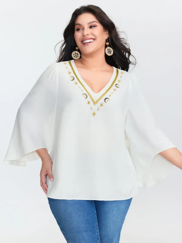 Star Moon Embroidered Neckline Flared Blouse sold by Bloomchic