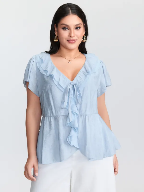 Ruffled Bow-Tie Neckline Textured Blouse sold by Bloomchic