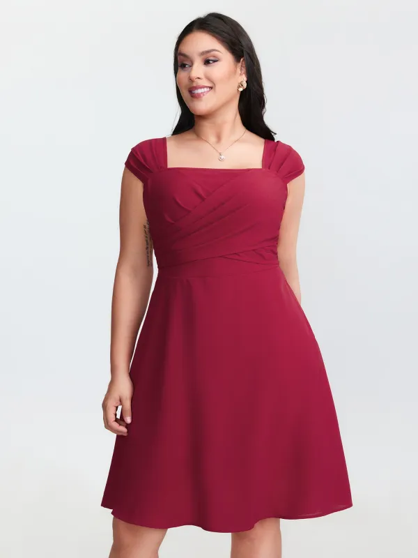 Twist-Front Pleated Pockets Mini Dress sold by Bloomchic